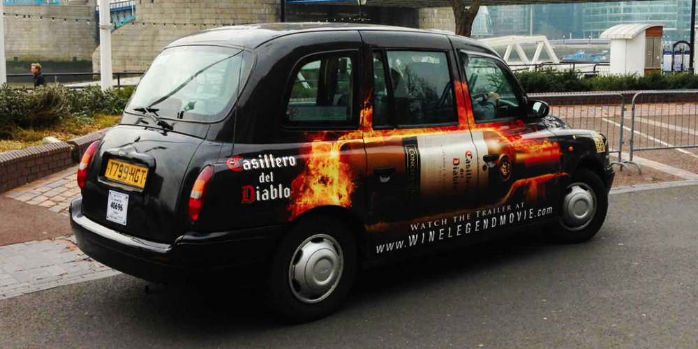 mega side taxi advertisement in the uk